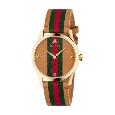 Gucci G-Timeless / orologio unisex / quadrante in pelle marrone / cassa acciaio e PVD dorato / cinturino pelle marrone