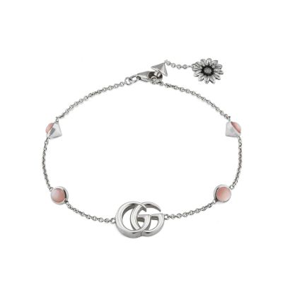 Gucci / GG Marmont / bracciale con fiore e Doppia G / argento, pietre in madreperla rosa