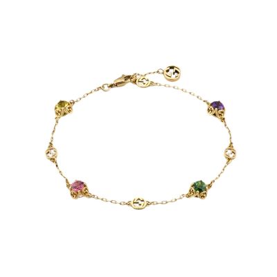 Gucci / Interlocking / bracciale GG con pietre preziose / oro giallo