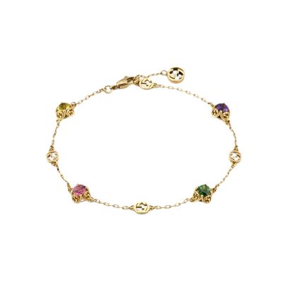 Gucci / Interlocking / bracciale GG con pietre preziose / oro giallo