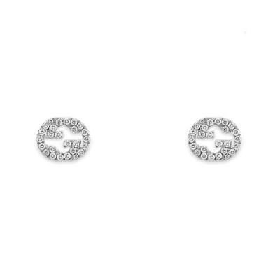 Gucci / Interlocking G / orecchini a bottone con incrocio G / oro bianco e diamanti